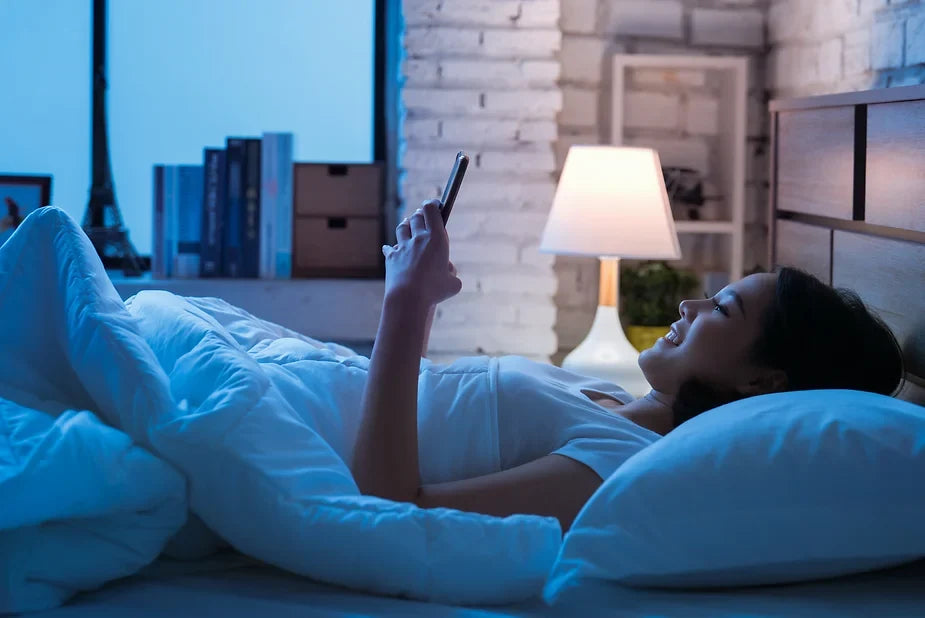 Why Using Your Phone in Bed Hurts Your Sleep, even on a Great Custom Mattress